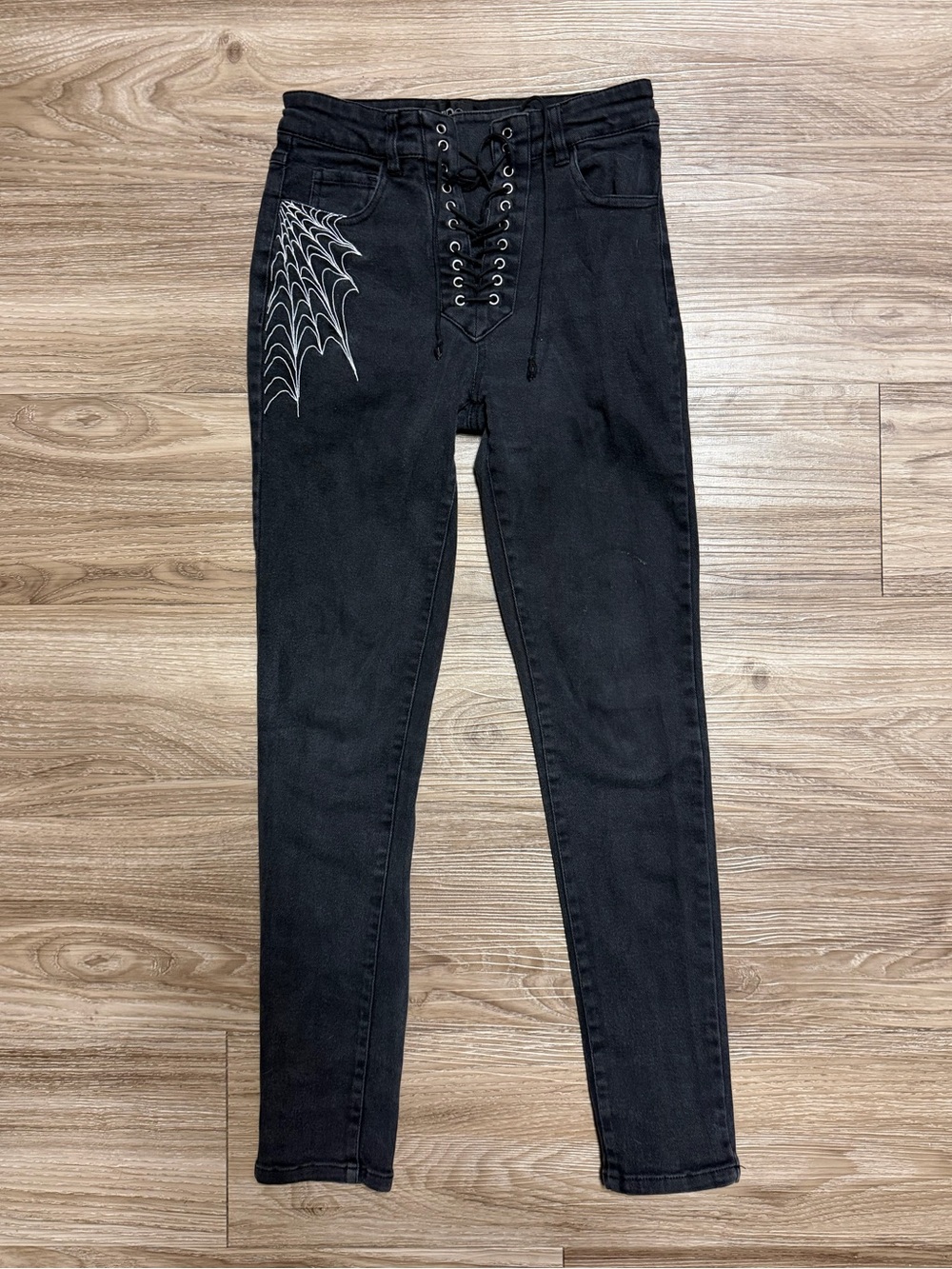 Dolls Kill Widow Black Skinny Jeans with Lace-Up Front and Spiderweb Detail S